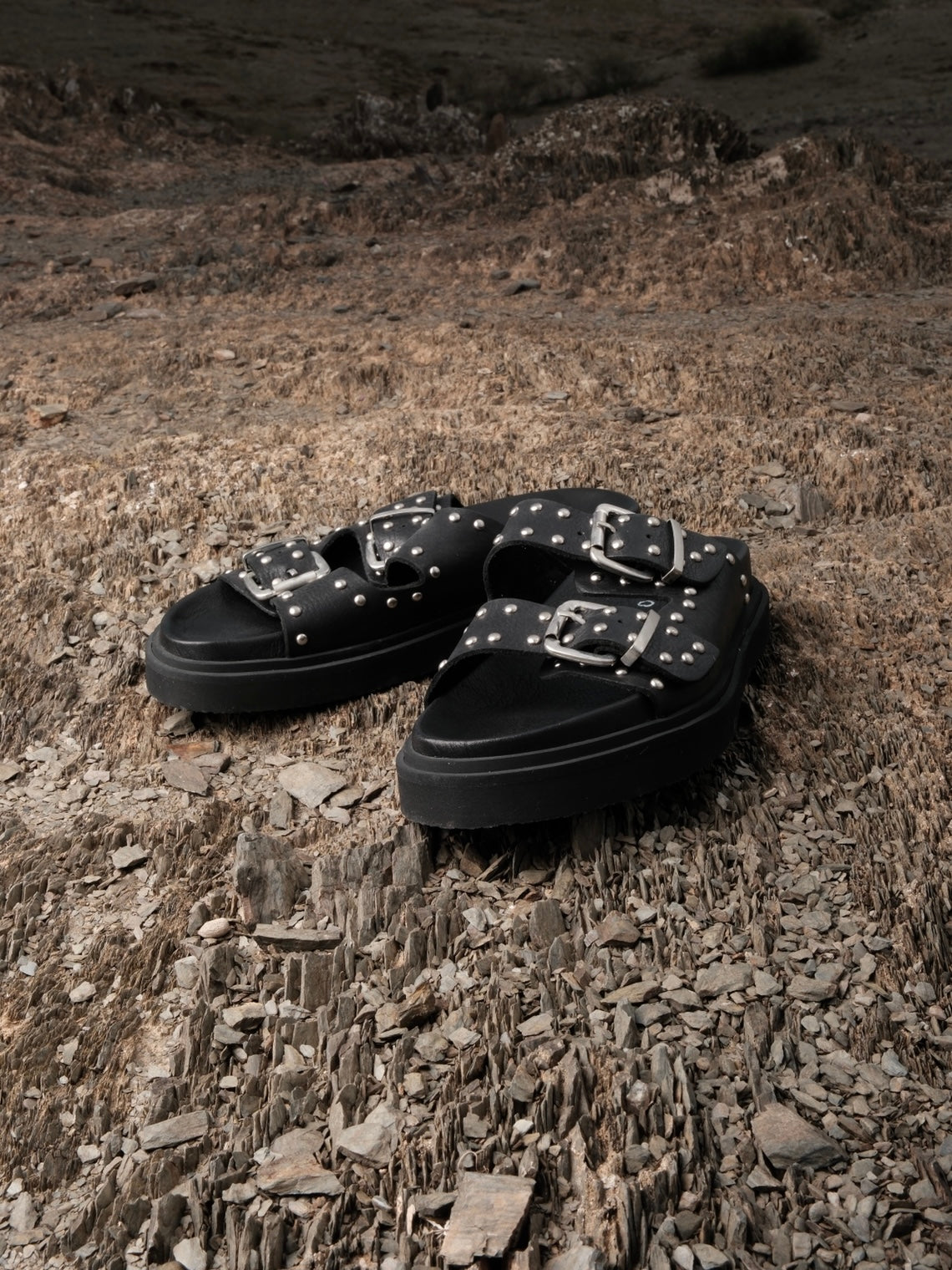 Black leather sandals with double buckles