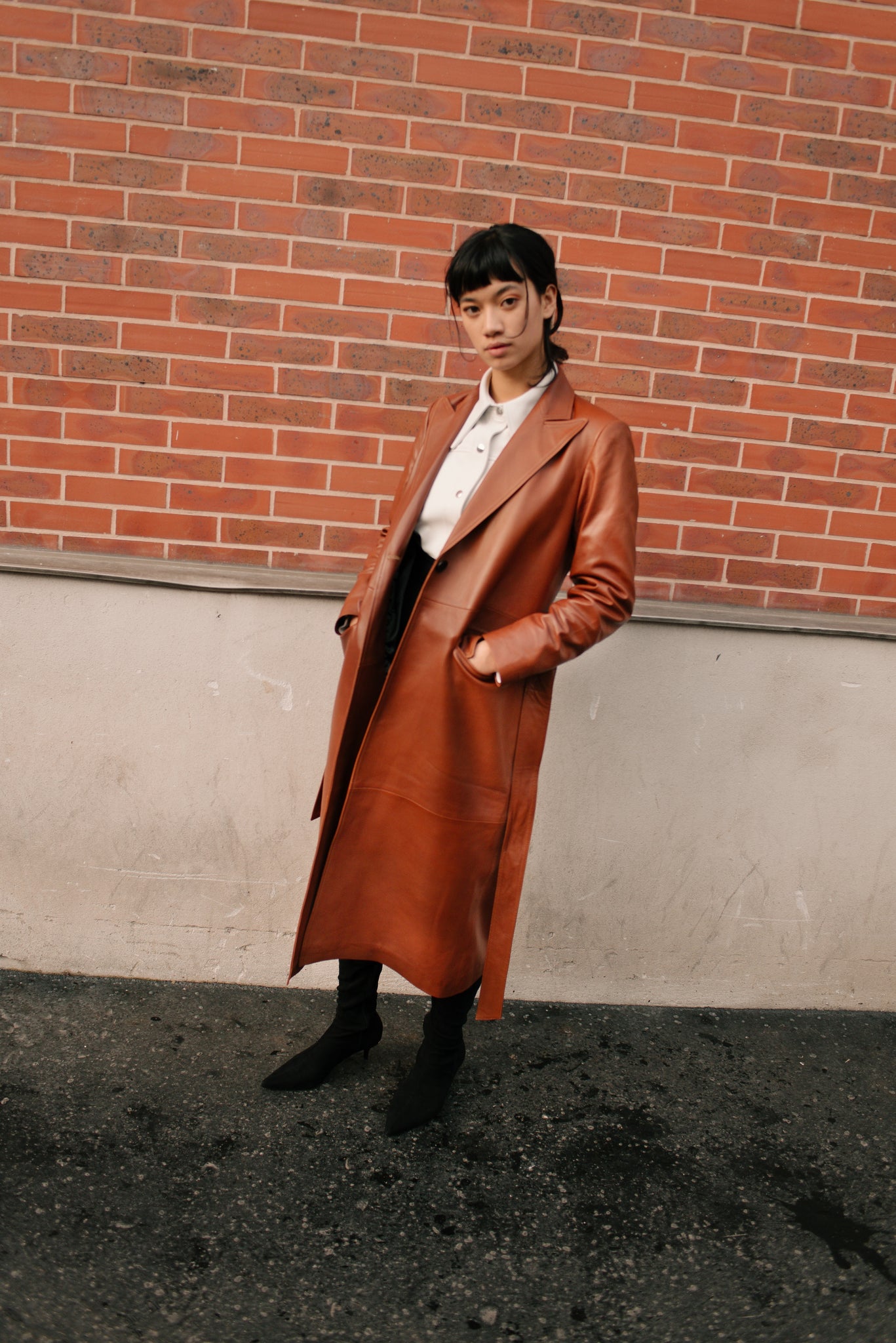 Le long trench en cuir