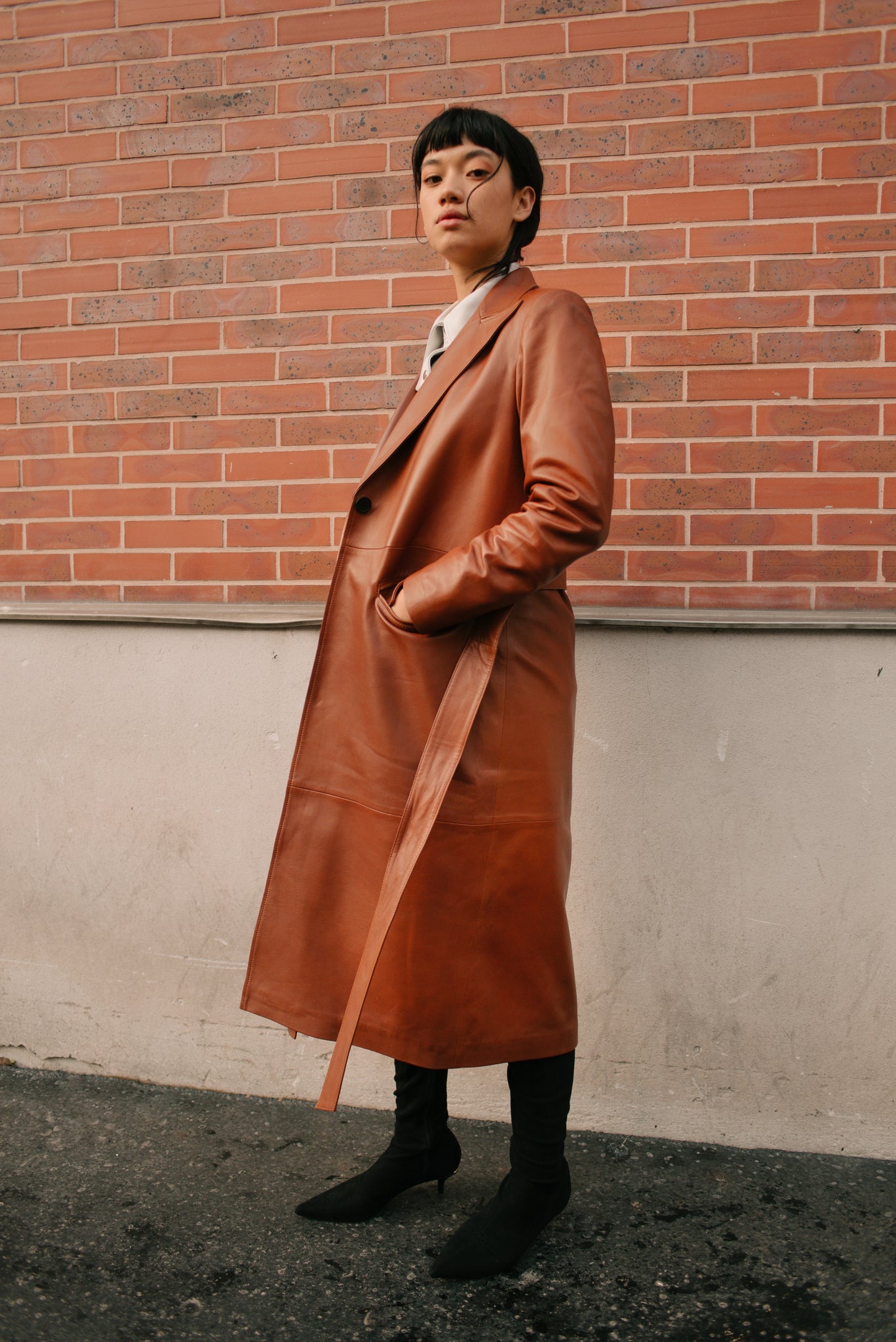 Le long trench en cuir