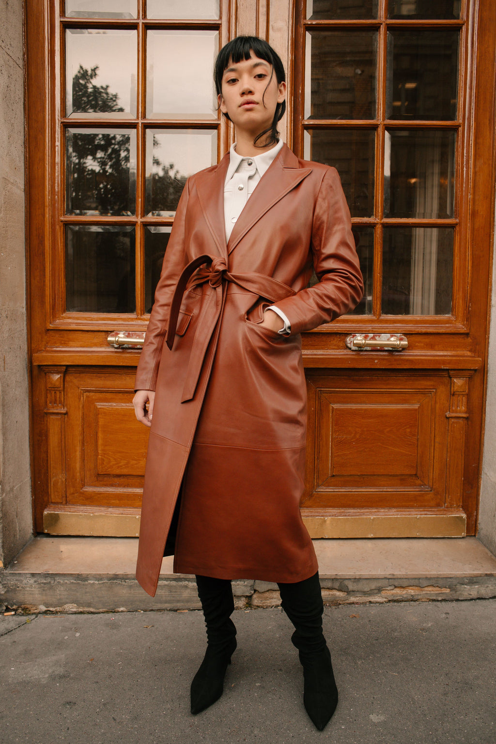 Le long trench en cuir