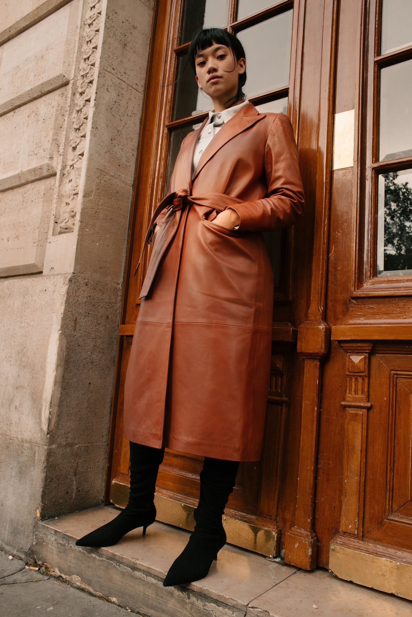 Le long trench en cuir