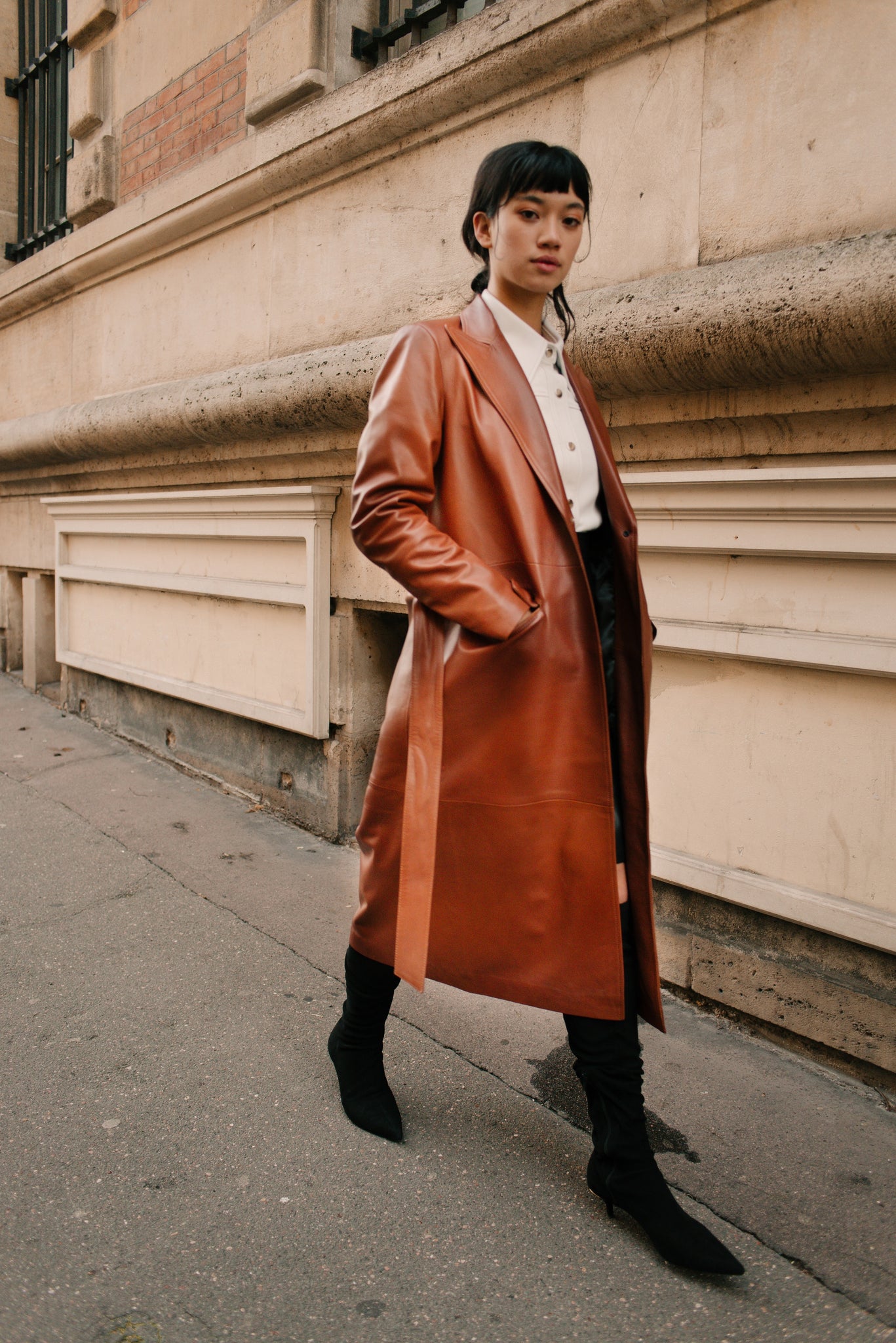 Le long trench en cuir